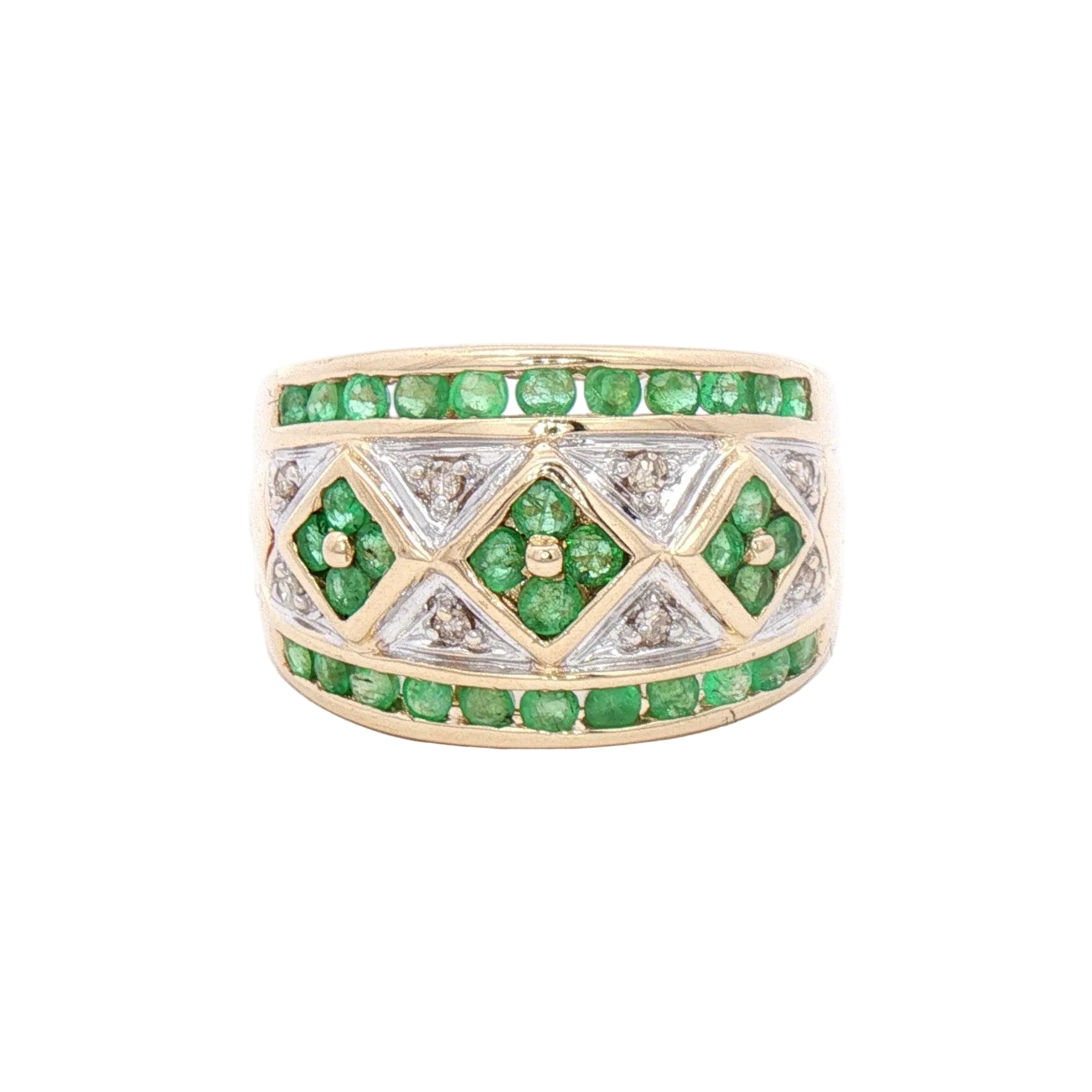 A wide gold ring featuring a geometric diamond pattern set with green emeralds and clear diamonds.
