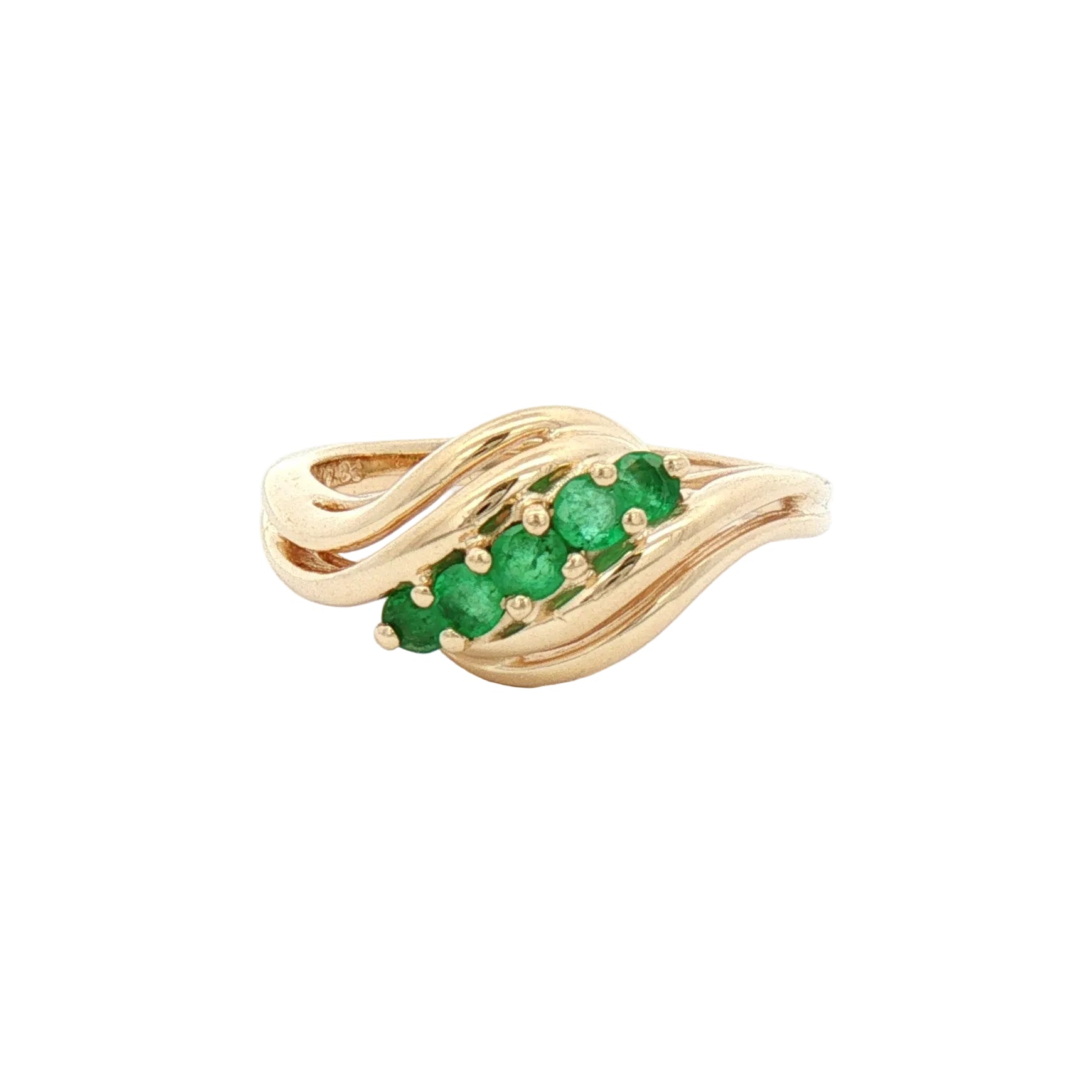 A yellow gold wave-shaped ring featuring a row of green emerald-cut gemstones.