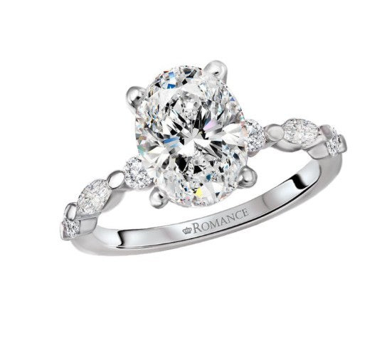 A Romance Semi-Mount Diamond Engagement Ring in 14kt white gold with an oval center and lab-grown diamonds on the band.
