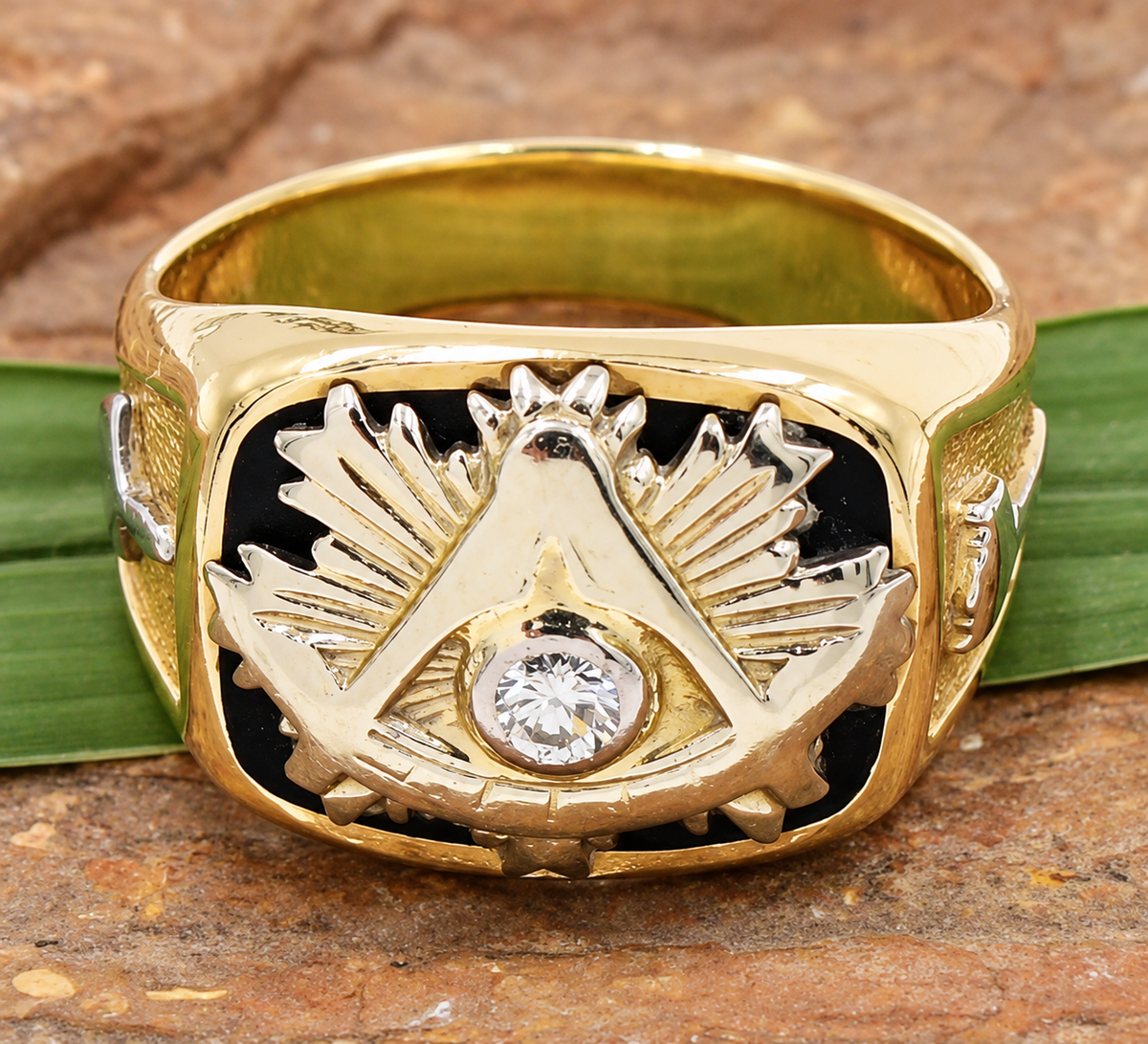 Estate 14k Yellow Gold Diamond Masonic/Freemason ring with a central diamond in a square and compass emblem on black.