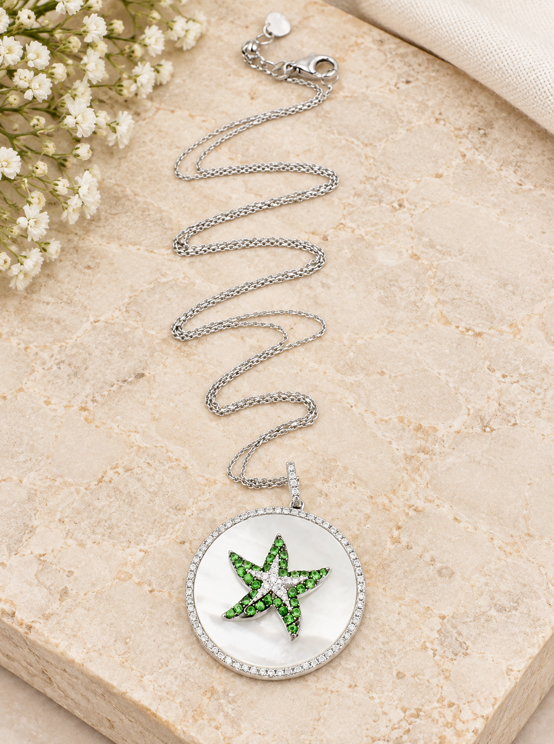 Kent Island Jewelry Estate 14k White Gold Diamond MOP & Green Gem Starfish necklace with a mother-of-pearl starfish pendant.