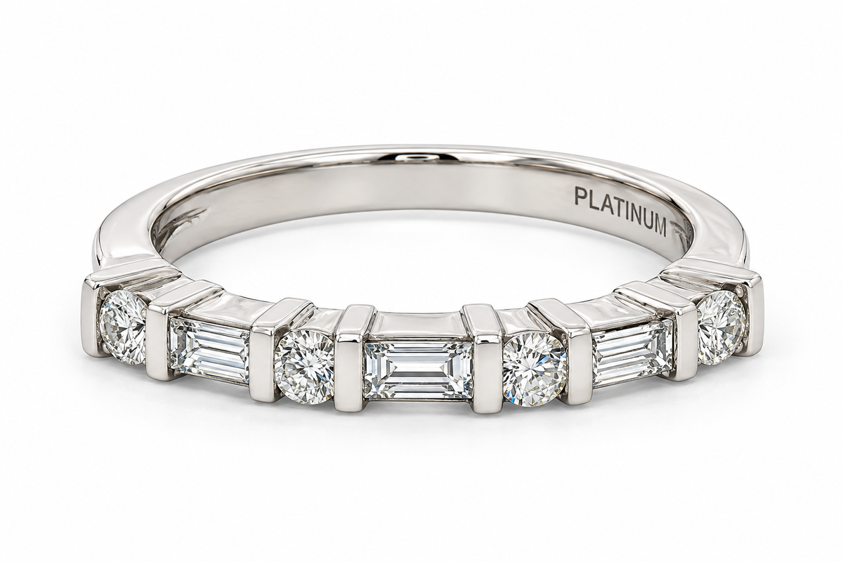 Kent Island Jewelry’s Platinum Diamond Ring features modern, alternating shapes—perfect for weddings or anniversaries.