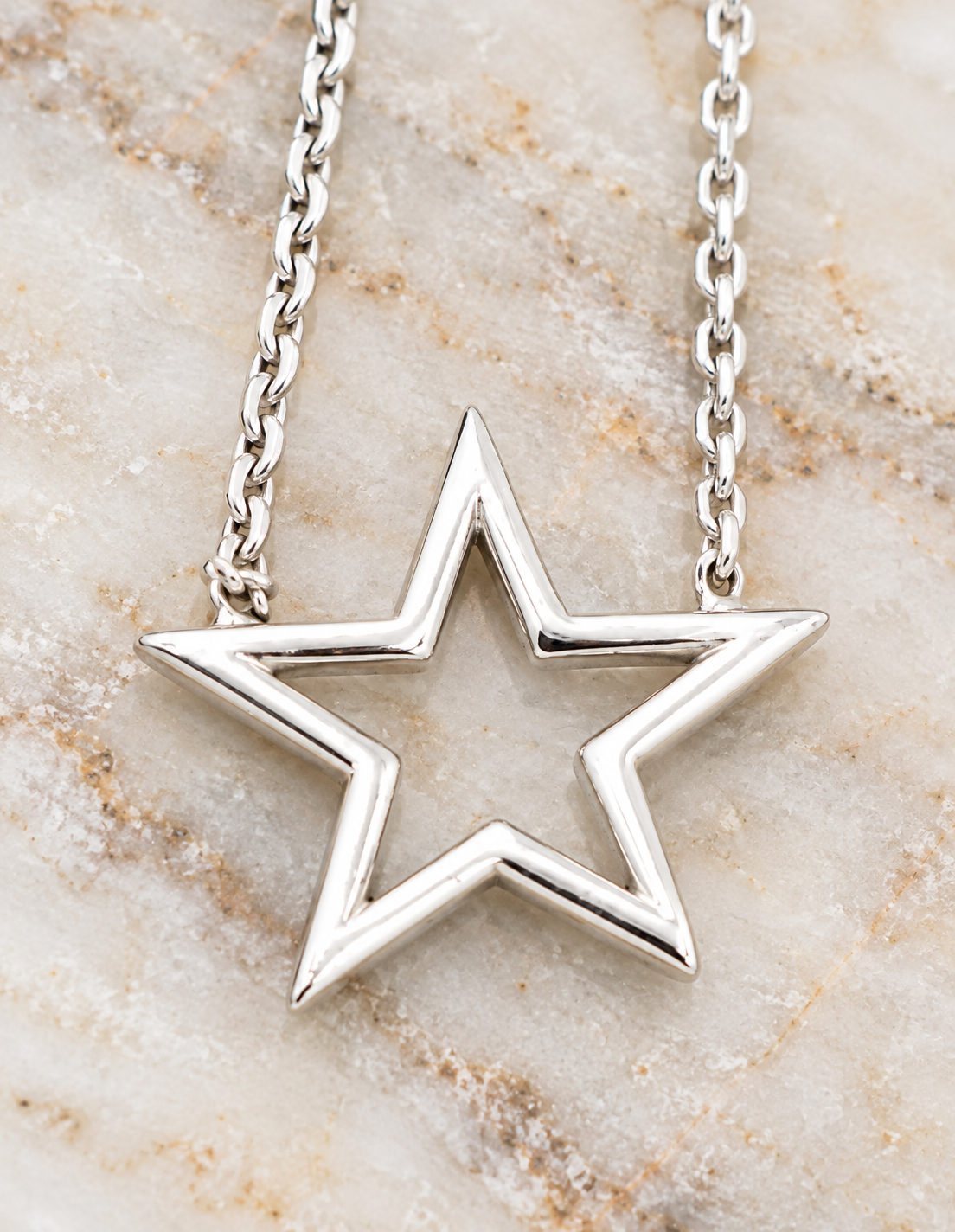 Estate 14k White Gold Designer Midas Open Star cable chain necklace featuring an open star pendant.