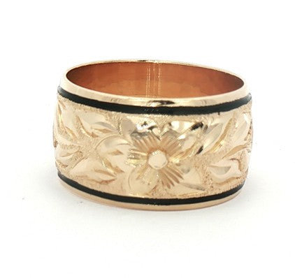 Kent Island Jewelry 14K gold band features hand-engraved vintage florals and black accents on the edges.
