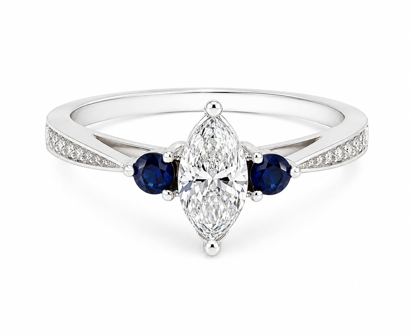 A white gold ring featuring a marquise-cut clear center stone, flanked by two round deep blue sapphires and a row of small pavé-set clear stones on the band, shown on a plain white background.