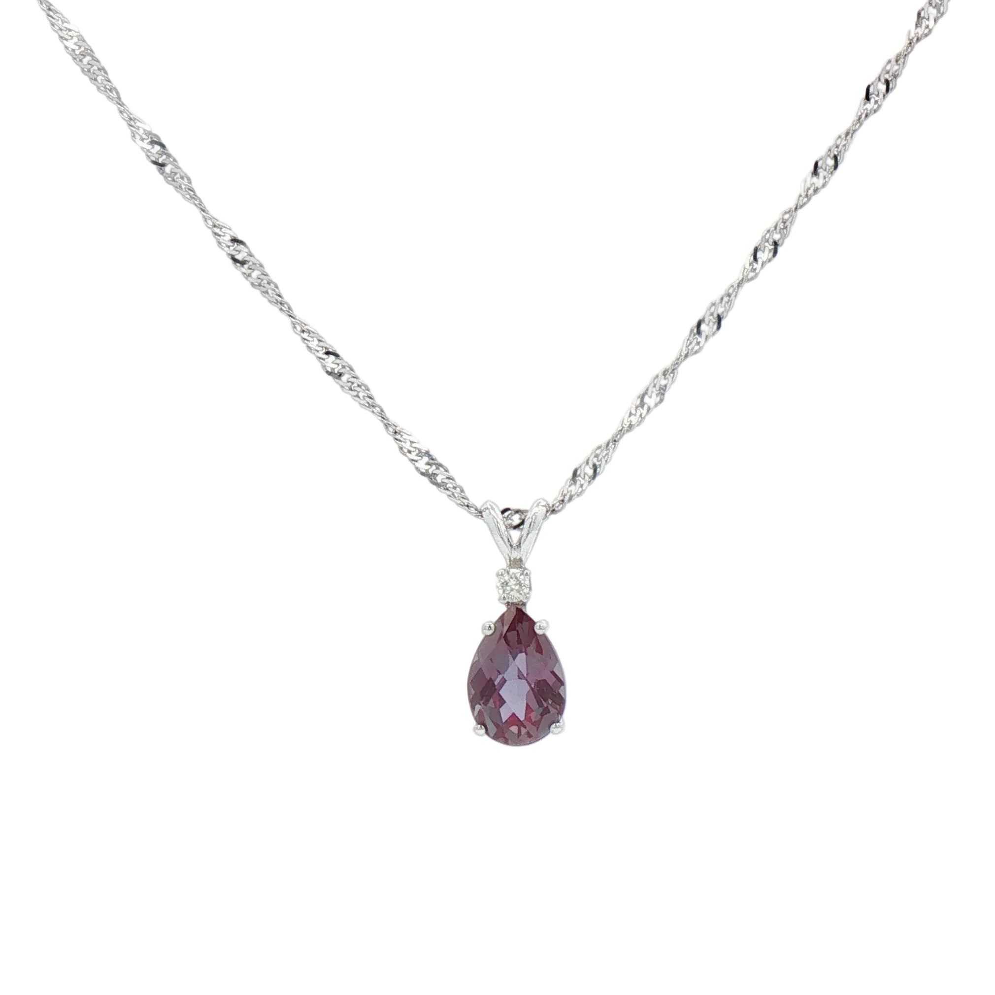 White gold mystic topaz and diamond necklace.