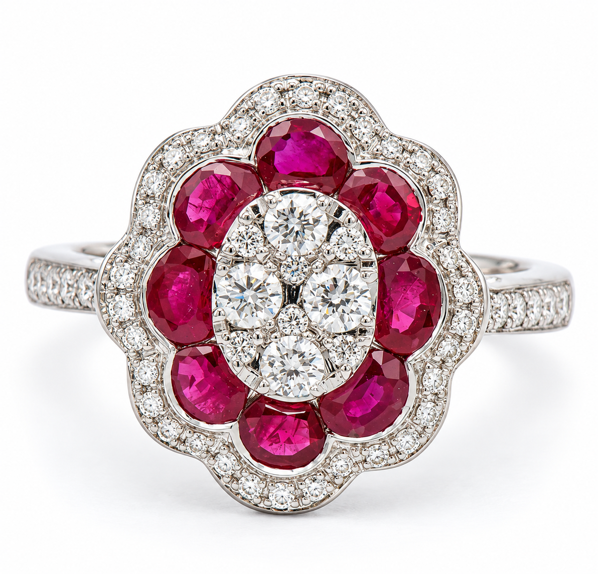 Venetti’s 14K white gold ruby ring features a vintage diamond flower cluster and sparkling oval diamond halo.