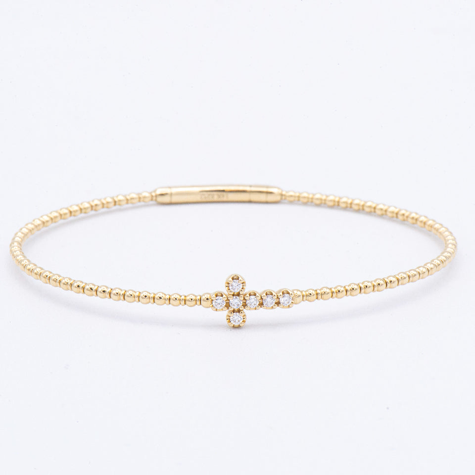 Epoque Jewelry 14k Diamond Cross Flex Bangle Bracelet—delicate faith piece with a sideways diamond cross charm.