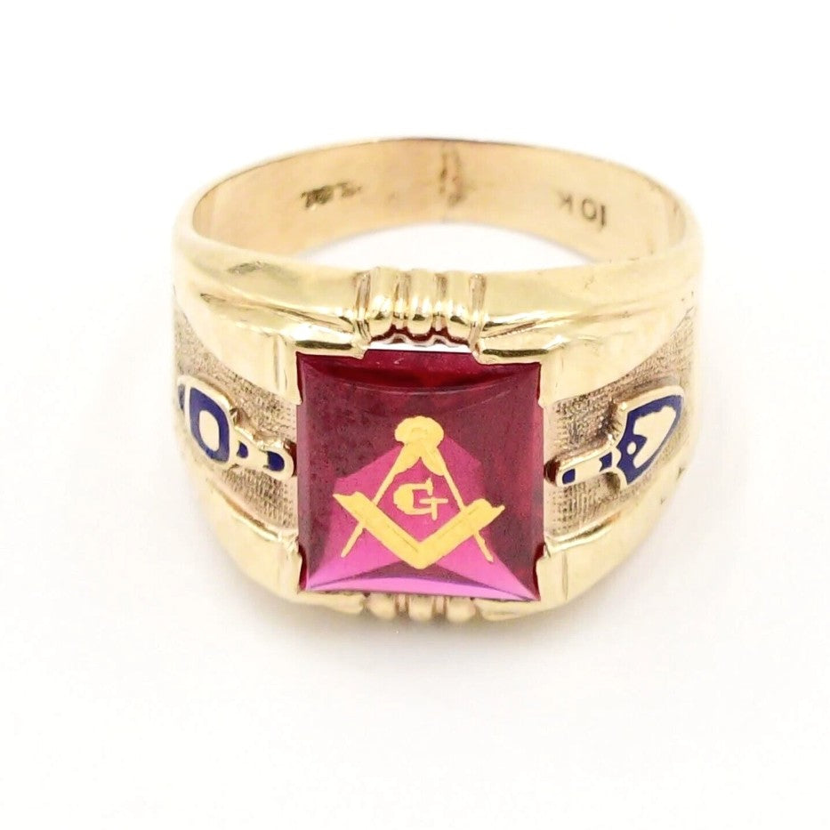 Kent Island Jewelry Estate 10k yellow gold Masonic ring with ruby and the classic compass, square & G symbol.