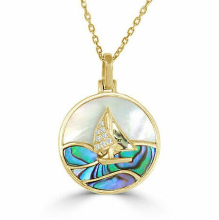 Gold pendant with a sailboat design.