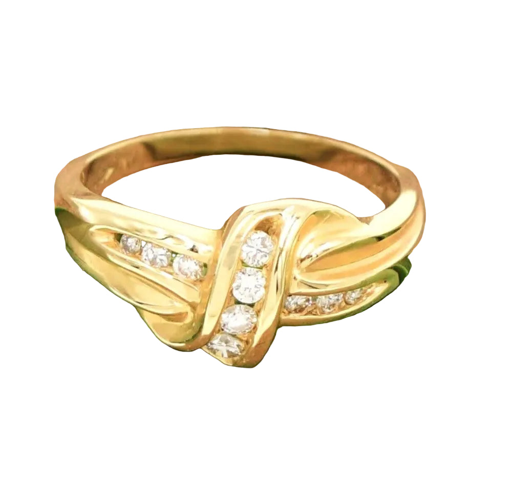 Kent Island Jewelry Estate 14k YG X crossover band ring with .16tcw diamonds at center.
