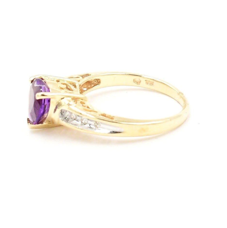 Estate 10k yellow gold heart amethyst & diamond (.03 tcw) ring by Kent Island Jewelry—shown from the side.