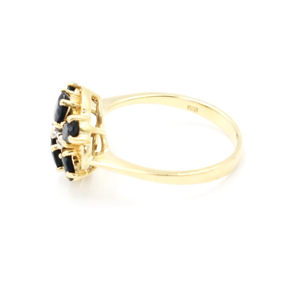 Kent Island Jewelry Estate 14K yellow gold ring with sapphire and diamond cluster, viewed from the side.