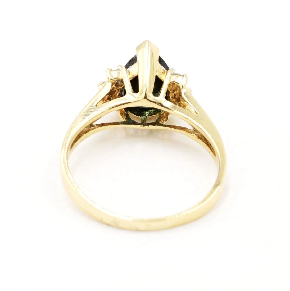 Estate 14k yellow gold sapphire and diamond (.06 tcw) ring by Kent Island Jewelry, back view on white.