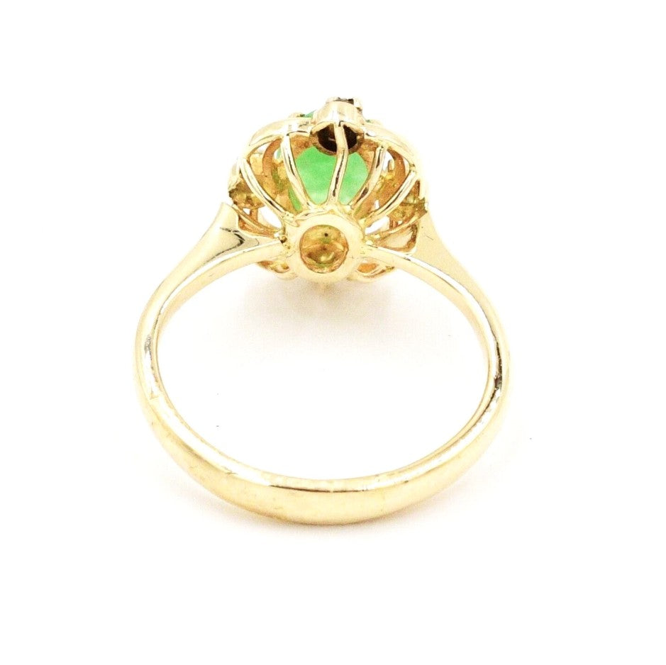 Kent Island Jewelry Estate 14k YG Diam (.04 tcw) & Emerald Ring with raised emerald, shown from the back on white.