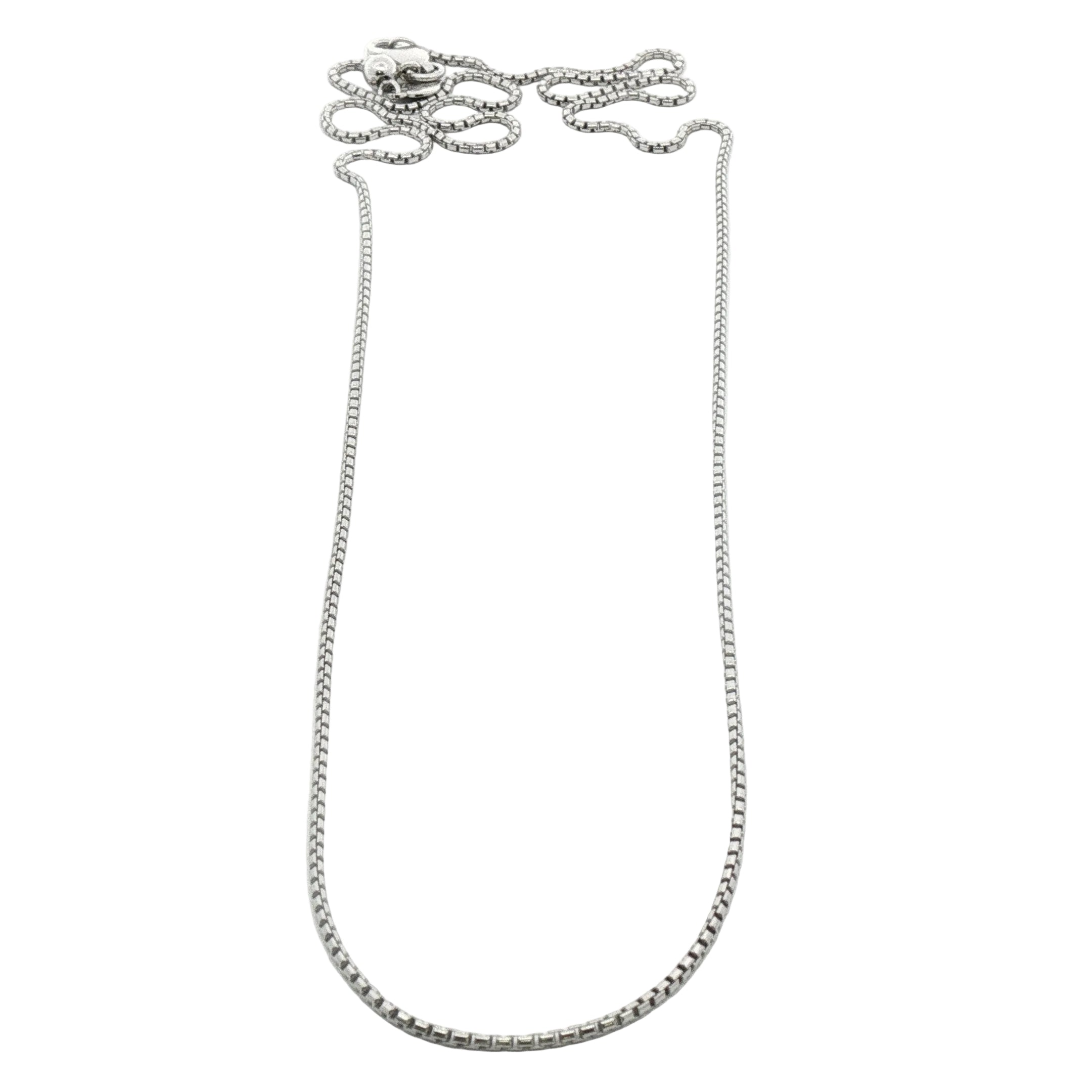 The Kent Island Jewelry SS polished 3.0mm double diamond-cut curb chain, 22", coiled at top and in a U shape below.