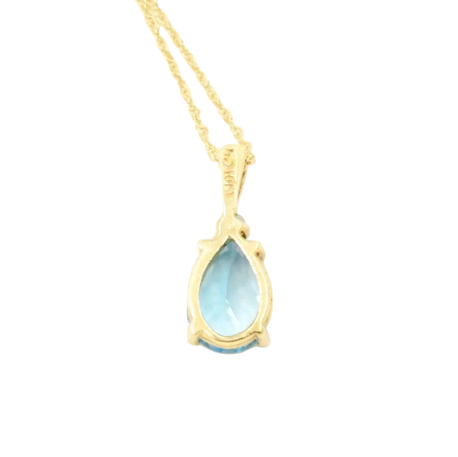 Kent Island Jewelry Estate 10K Yellow Gold Blue Topaz & White Sapphire Pendant Necklace on white background.