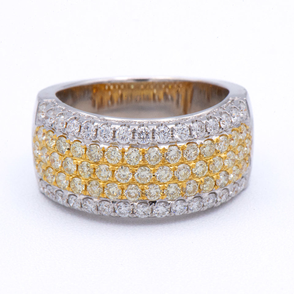 The Roman & Jules 18k Multi-Row Yellow & White Diamond Ring features rows of sparkling diamonds in a wide silver band.