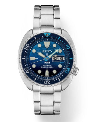 Seiko Prosepex Diver SS Automatic Blue Dial PADI SE Watch with day-date display and metal bracelet.