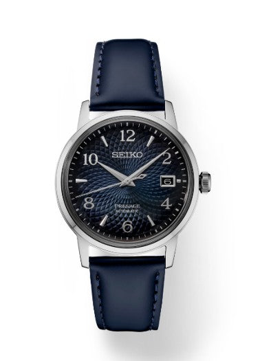 Seiko Presage Cocktail Time Watch with blue textured dial, silver case, date window, and blue leather strap.