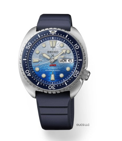Seiko Prospex JAWS 50th Anniversary Limited Edition with blue gradient dial, blue rubber strap, and day-date at 3 o’clock.
