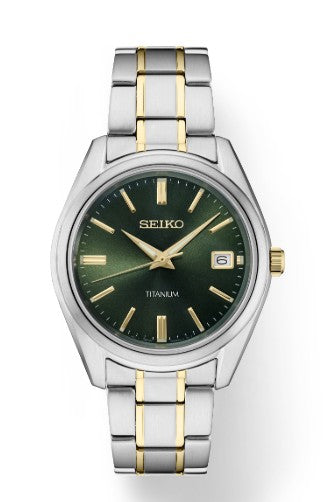 Seiko Essentials Collection Watch with minimalist green dial, gold markers, date window, and two-tone silver-gold band.