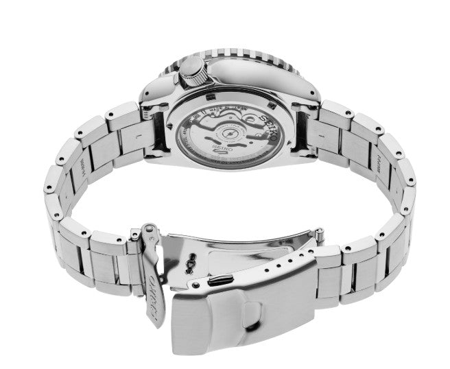 Seiko 5 Sports SS Automatic Watch with blue dial, navy bezel, and transparent case back showcasing the mechanism.