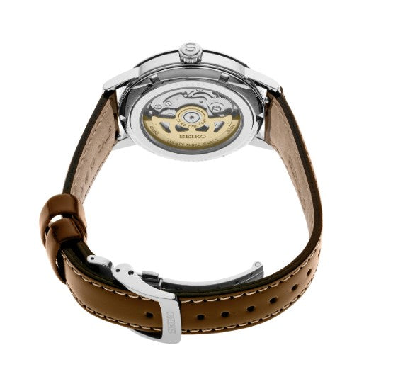 A Seiko Presage Cocktail Time SS Automatic Green Dial watch with an exposed automatic movement shown from the back.