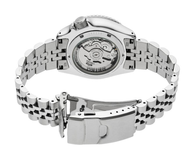 Back view of a Seiko Automatic 5 Sports SKX GMT watch, open metal bracelet, and visible automatic movement.