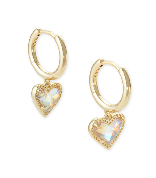 Kendra Scott ARI HEART HUGGIE EARRINGS in gold with dichroic glass hearts shown against a white background.