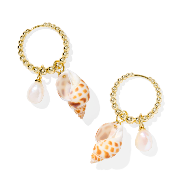 Kendra Scott Oleana Huggie Earrings in gold with removable spotted shell and pearl charms, on a white background.