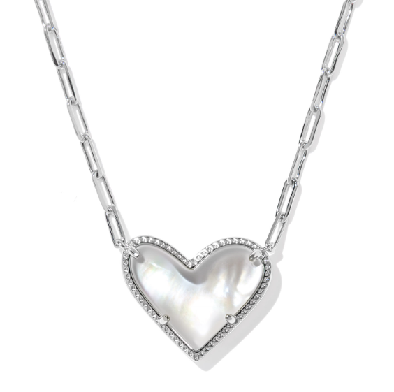 Kendra Scott Ari Heart silver necklace with an ivory mother of pearl pendant accented by clear stones.