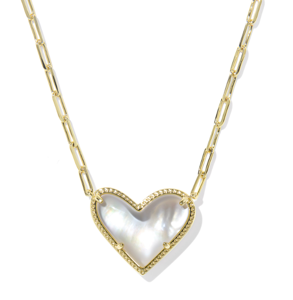 Kendra Scott ARI Heart Statement Necklace in gold with an ivory mother-of-pearl charm for a standout look.