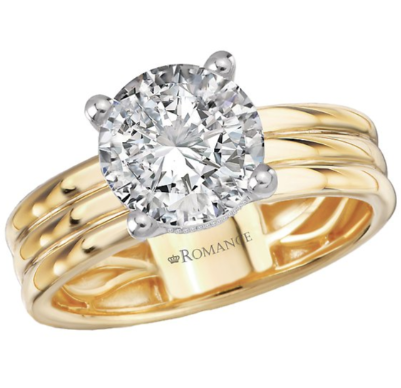 The Romance Diamond Semi-Mount Hidden Halo Engagement Ring features a double 14kt yellow gold band and large round solitaire.