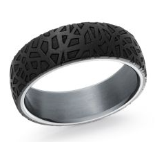 Black and silver tantalum ring with intricate design.