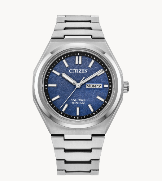 Citizens Zenshin Three-Hand Watch: silver, blue face, Super Titanium case, Eco-Drive tech; shows time, day, date.