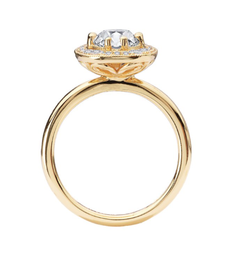 Romance Engagement Ring: marquise center, cushion-shaped halo, and slim band in yellow gold, shown from the side.