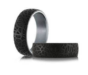 Black and silver tantalum ring with intricate design.