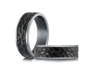 Silver colored tantalum ring with black textured band.