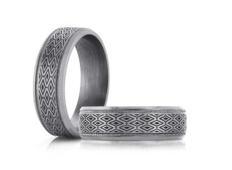 Silver colored tantalum ring with geometric pattern.