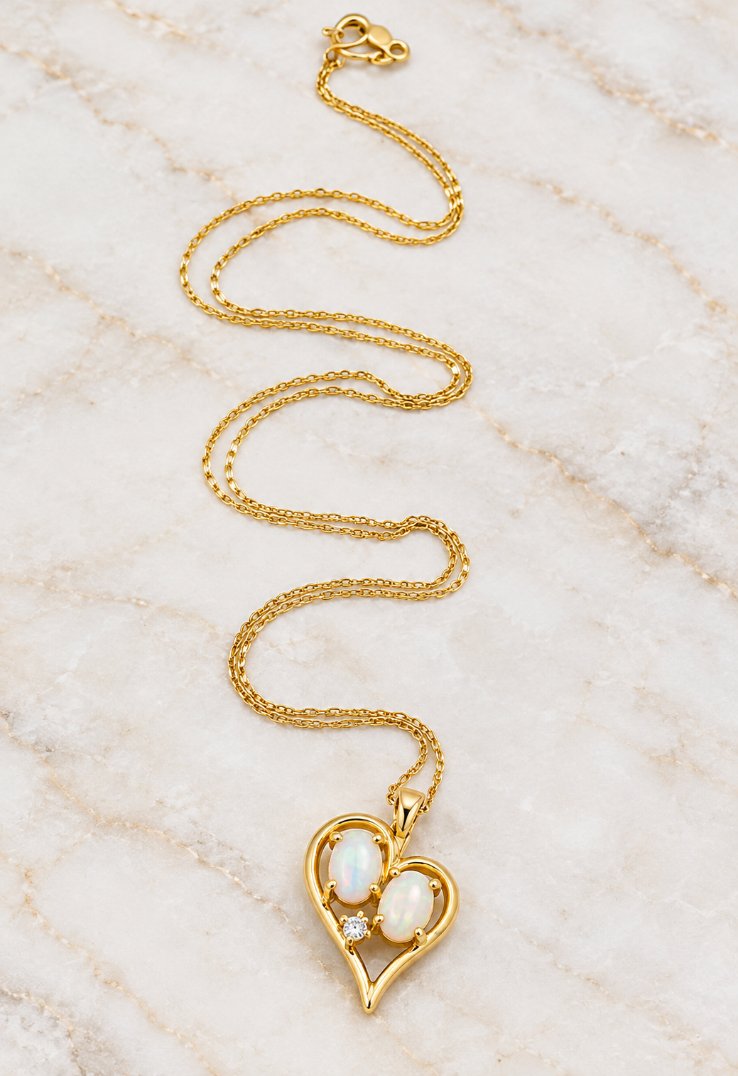 Kent Island Jewelry Estate 14k Yellow Gold Diamond & Fire Opal Gemstone Heart necklace with two oval opals and a diamond.