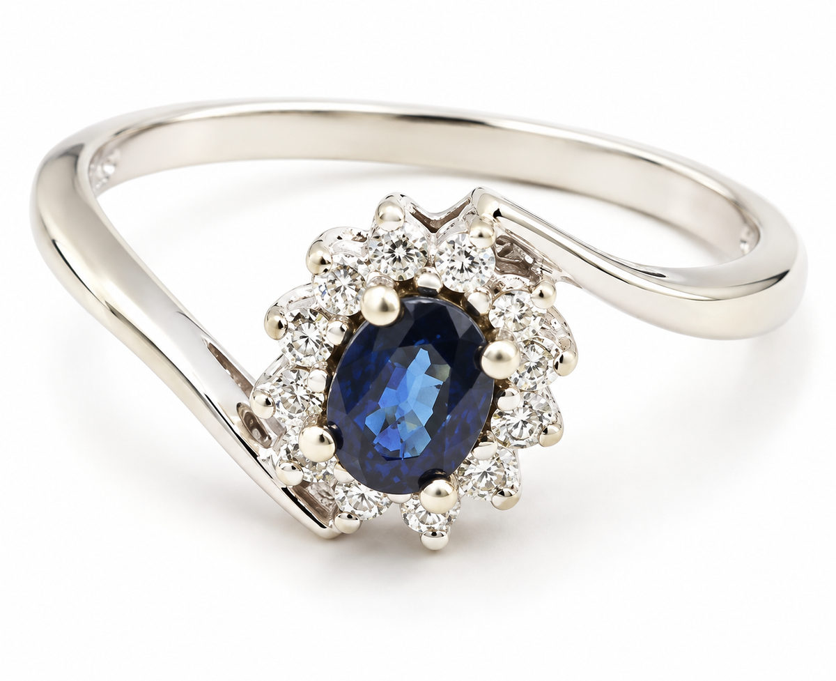 Estate 14k White Gold Diamond & Sapphire Gemstone Ring featuring an oval blue sapphire in a diamond halo bypass band.