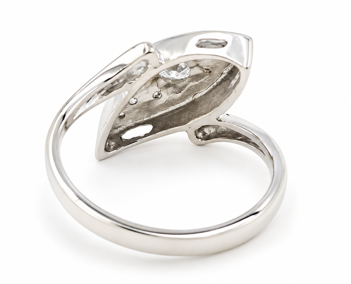 Estate 14k White Gold Diamond Cocktail Ring with a marquise-shaped design and a single inset diamond.