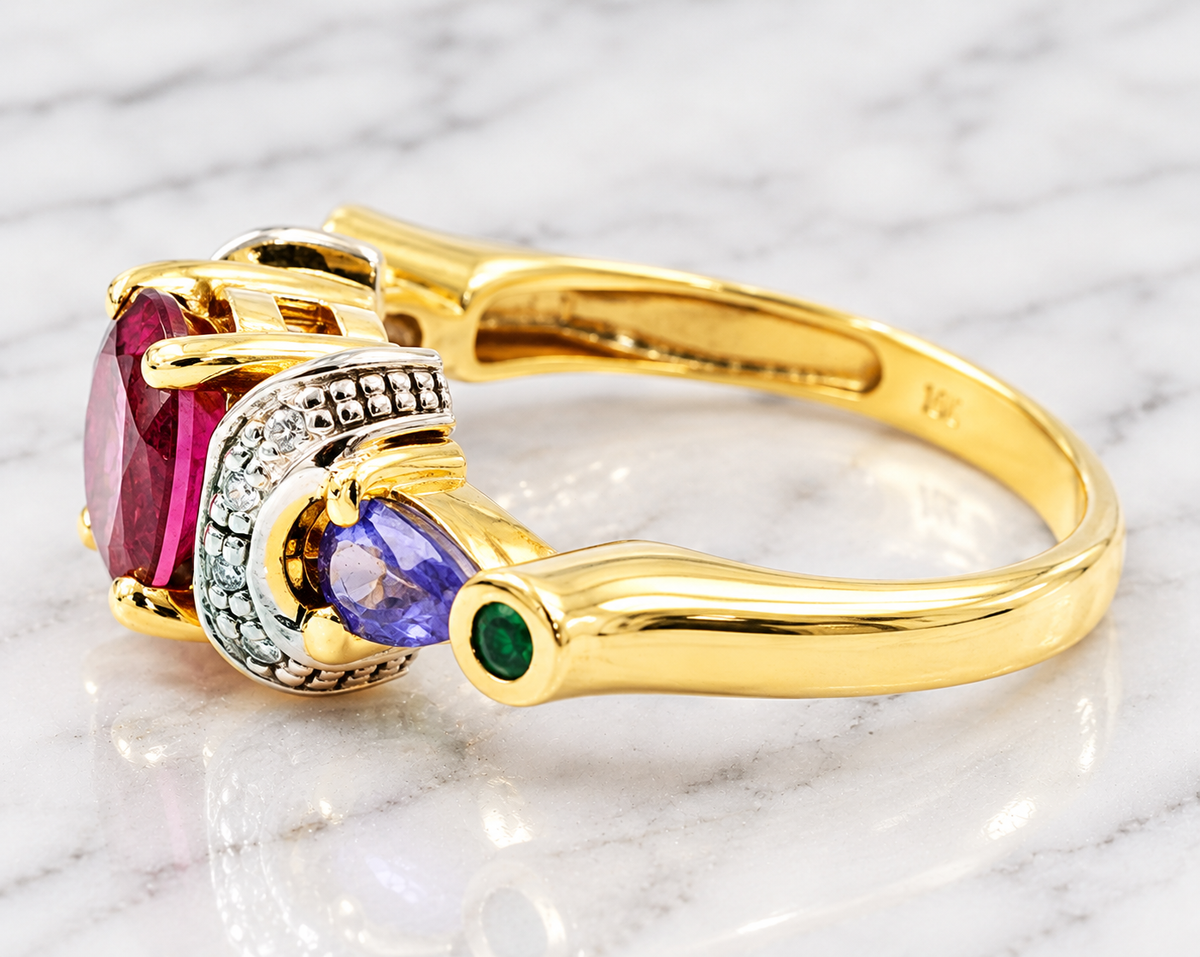 Kent Island Jewelry Estate 14k Yellow Gold Pink Tourmaline Diamond Emerald Gemstone Unique Ring with pear-shaped gemstone.