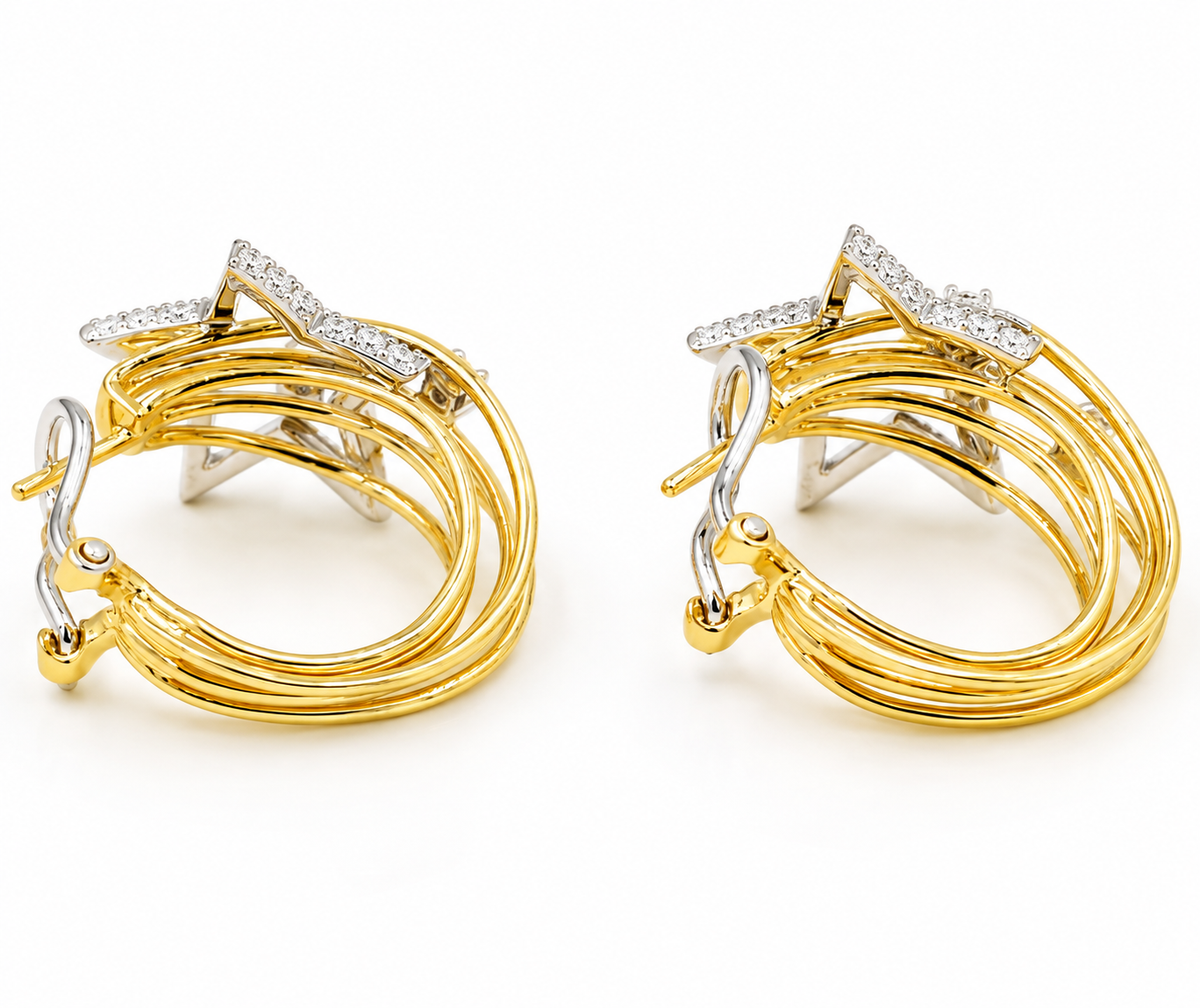 14k Yellow & White Gold Designer Sonia B Diamond Star Omega Back Earrings with multi-layered bands and star accents.