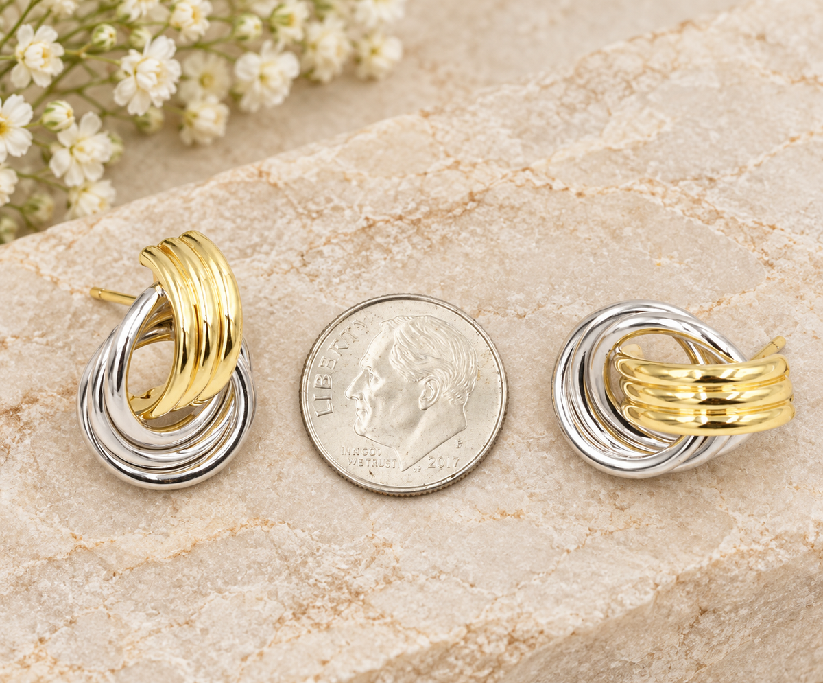 Estate 14k Yellow & White Gold Retro Double Knot Intertwined Earrings shown next to a U.S. dime for scale.
