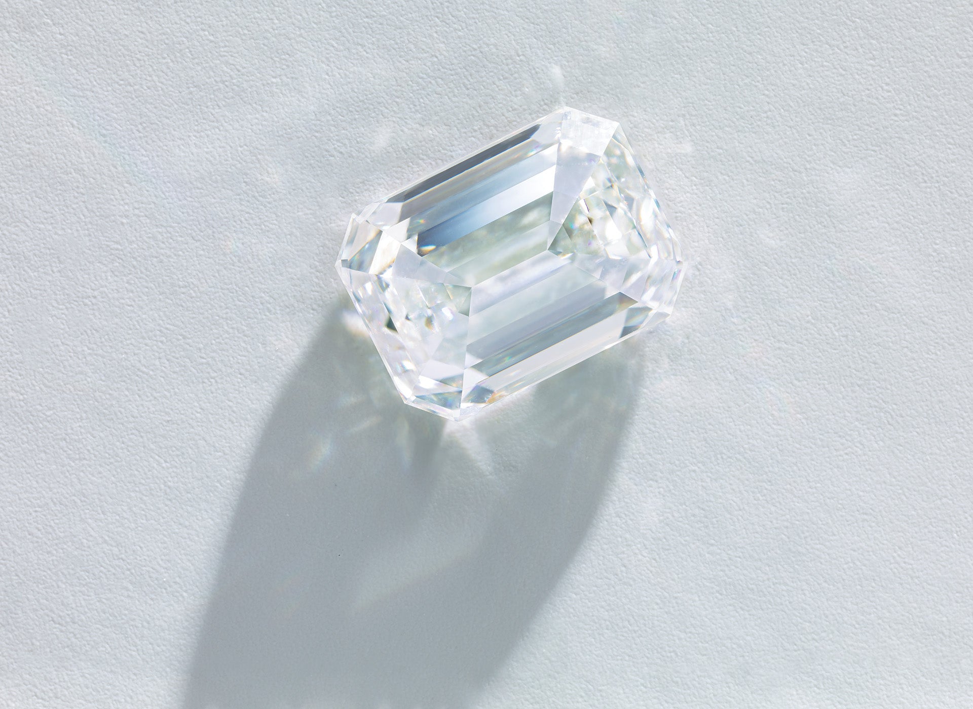 Rectangular cut diamond on a light gray background