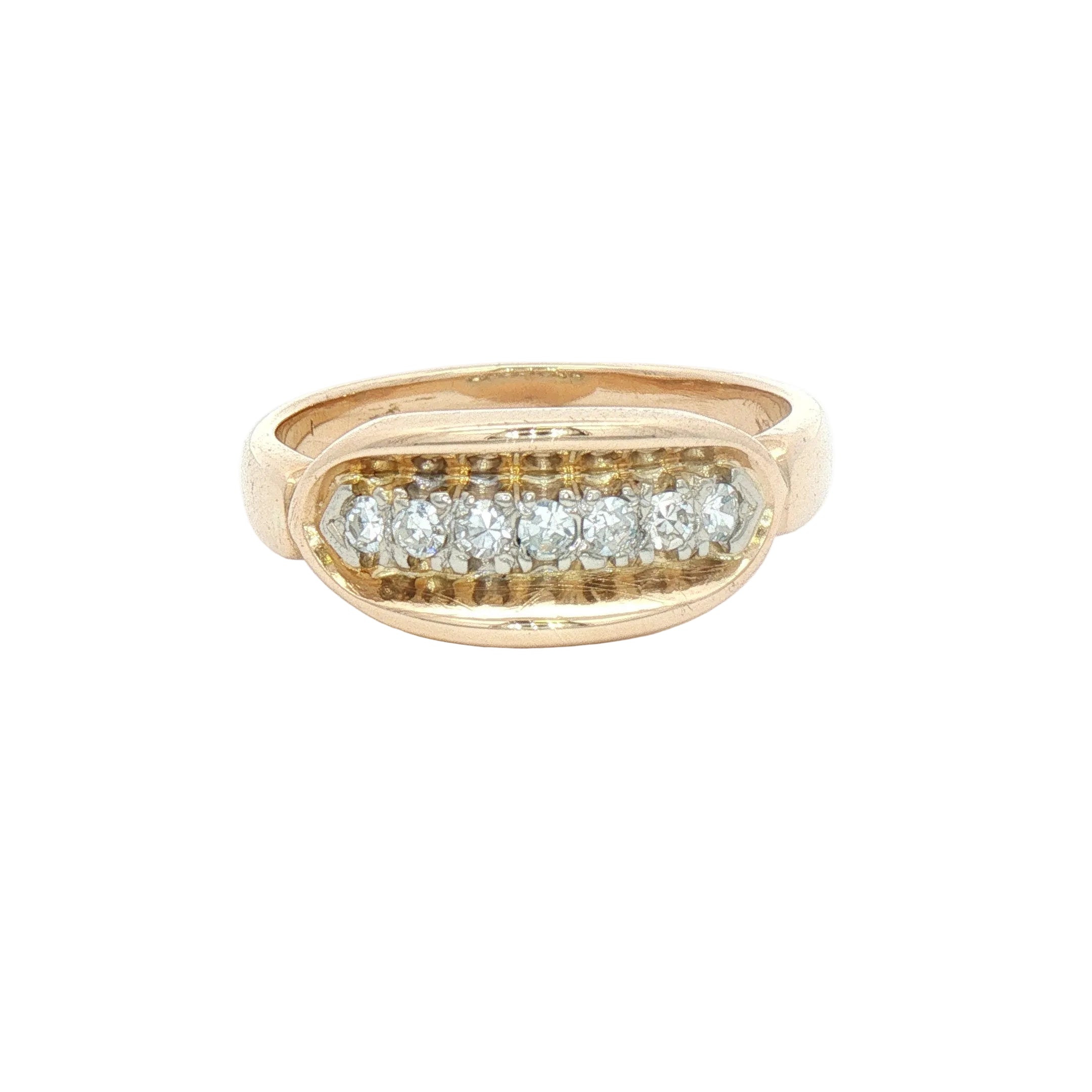 A yellow gold oval ring featuring a row of clear round-cut gemstones in a pavé setting.