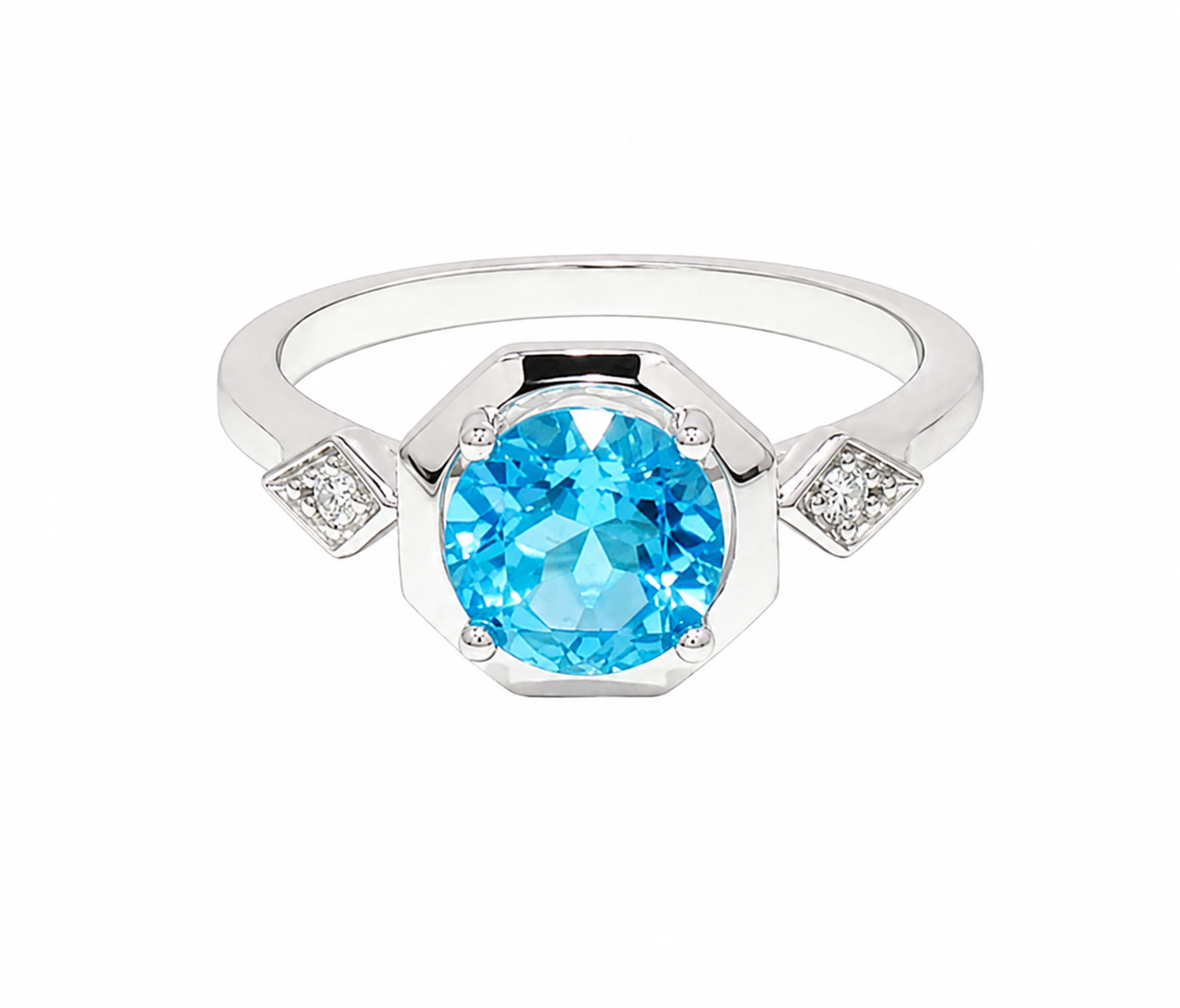 A white gold ring featuring a large round-cut light blue gemstone in a geometric bezel setting, flanked by two small diamond accents on the band.