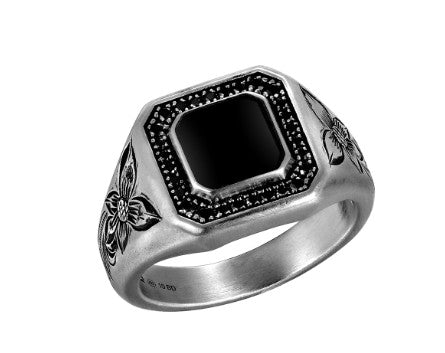 The Alamea SS 925 Onyx Ring features a black square gemstone and floral engravings on the band.